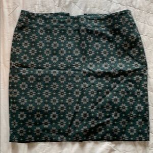 Green patterned mini pencil skirt.